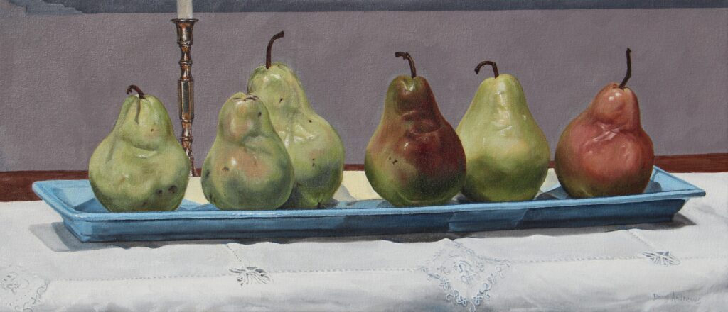 Pears ripening on a platter by Thomas Aitken with a brass candlestick and a linen tablecloth.